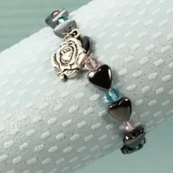 Palais du Rosaire Bracelet avec Perle Coeur hématite bleu/rose et médaille de Lourdes^ Bracelet Fantaisie