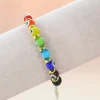 Palais du Rosaire Bracelet perles de verre et pierre de lave avec une croix^ Bracelet Fantaisie